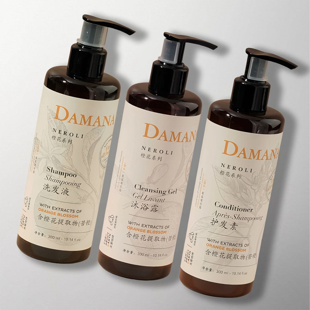 three luxury DAMANA NEROLI hotel toiletries.