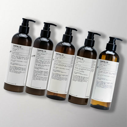 5 bottles of santal 33 hotel toiletries.